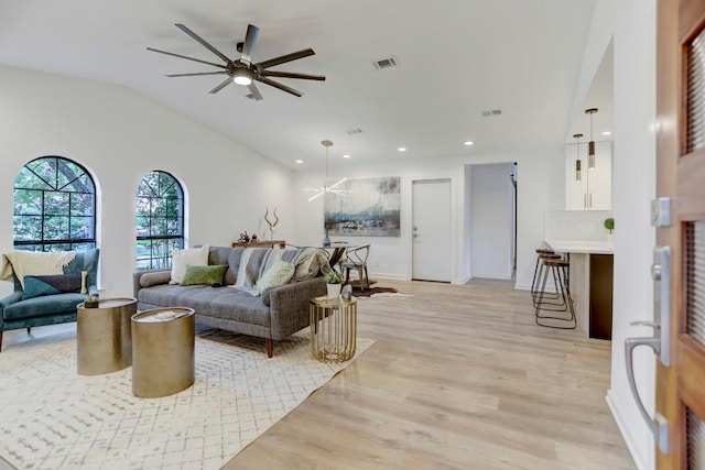 10206 Cripple Creek Cv, Austin, TX 78758 - living area with light wood-style flooring, lofted ceiling, a ceiling fan, and recessed lighting
