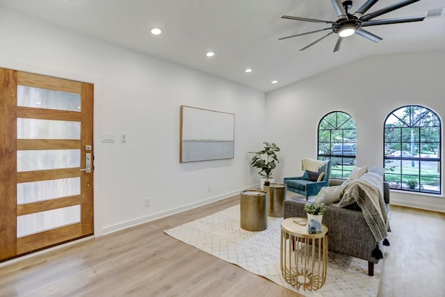 10206 Cripple Creek Cv, Austin, TX 78758 - living room with light wood finished floors, recessed lighting, ceiling fan, and lofted ceiling