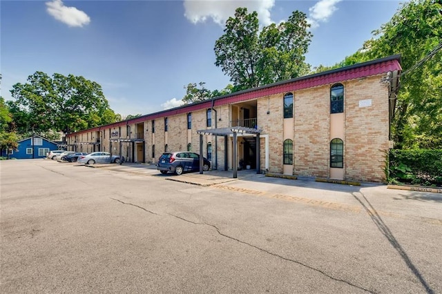 407 E 45th St Unit 108, Austin, TX 78751 - view of property featuring uncovered parking