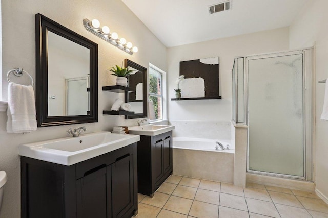 2807 Glenwood Trl, Cedar Park, TX 78613 - bathroom featuring a stall shower, two vanities, a garden tub, and tile patterned floors