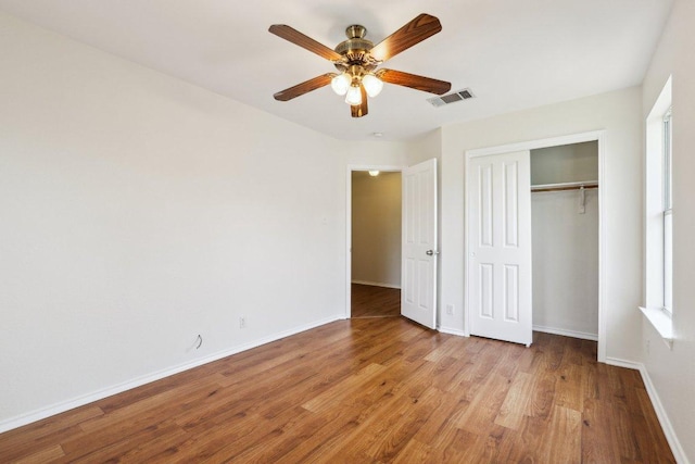 2807 Glenwood Trl, Cedar Park, TX 78613 - unfurnished bedroom featuring light wood finished floors, a closet, and ceiling fan