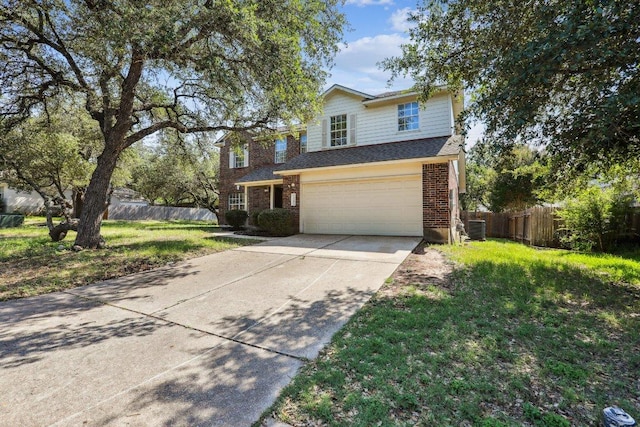 2807 Glenwood Trl, Cedar Park, TX 78613 - traditional home with a garage, driveway, and brick siding