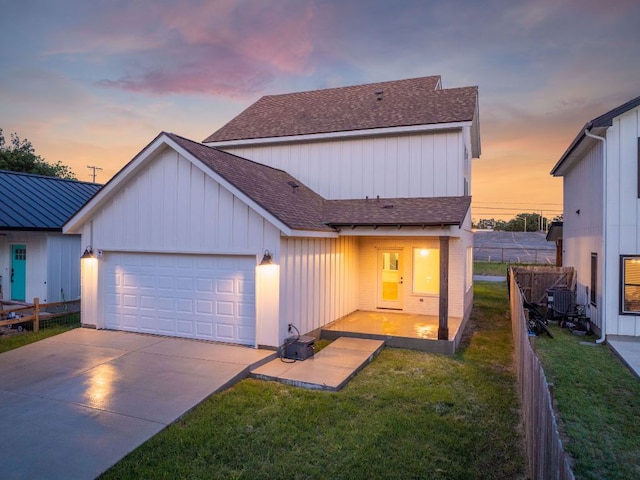 182 W Torrey St, New Braunfels, TX 78130 - view of front facade with a shingled roof, a garage, board and batten siding, and concrete driveway