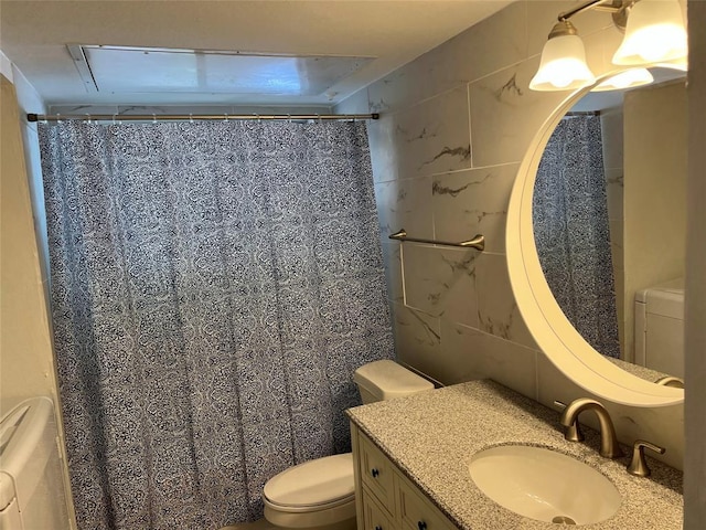 1015 E Yager Ln Unit 77, Austin, TX 78753 - bathroom with tile walls, vanity, and a shower with shower curtain