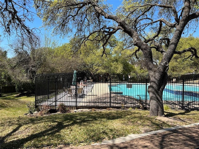 1015 E Yager Ln Unit 77, Austin, TX 78753 - gate featuring a community pool