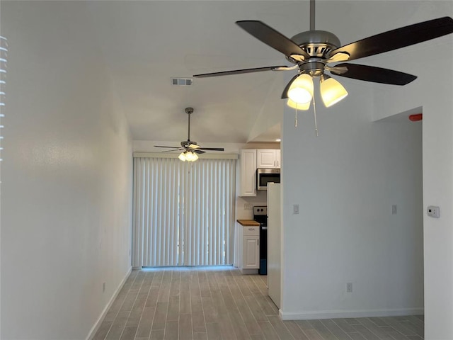1015 E Yager Ln Unit 77, Austin, TX 78753 - unfurnished living room with ceiling fan and light wood-style flooring