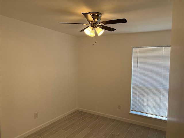 1015 E Yager Ln Unit 77, Austin, TX 78753 - spare room featuring wood finished floors and a ceiling fan