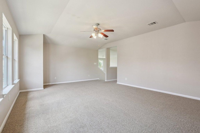 212 Boone Valley Dr, Round Rock, TX 78664 - carpeted spare room with vaulted ceiling and ceiling fan