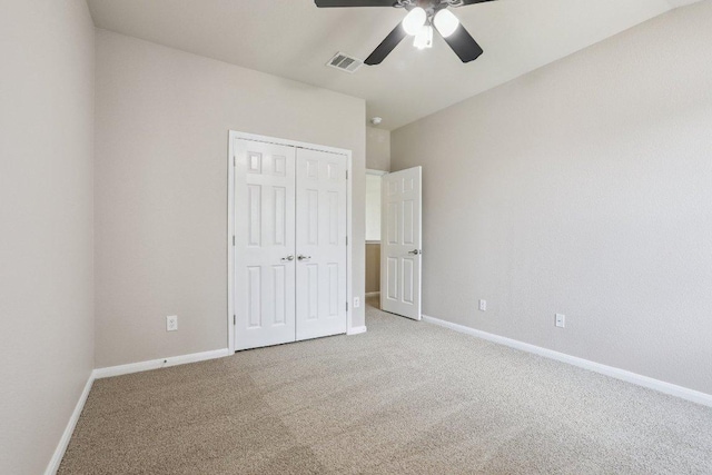 212 Boone Valley Dr, Round Rock, TX 78664 - unfurnished bedroom with light colored carpet, a closet, and ceiling fan
