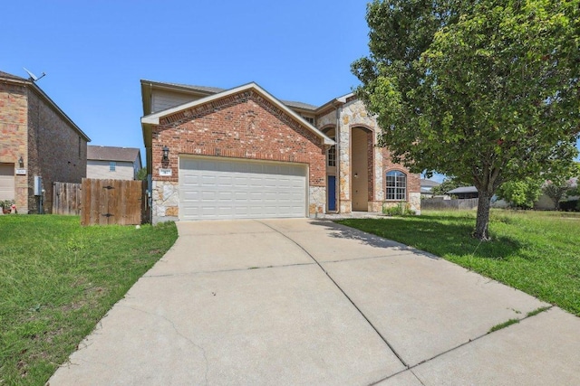 212 Boone Valley Dr, Round Rock, TX 78664 - traditional-style home with stone siding, an attached garage, concrete driveway, and brick siding