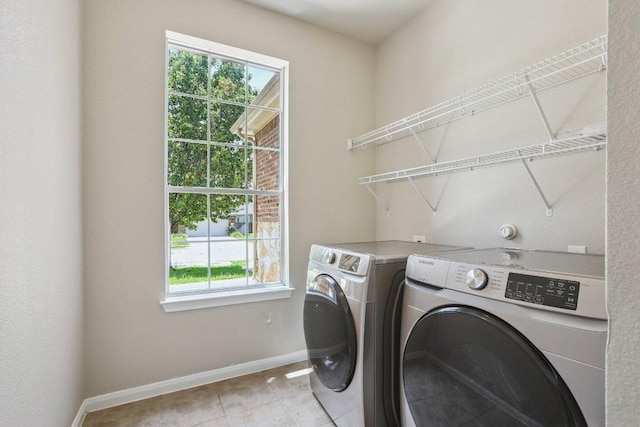 212 Boone Valley Dr, Round Rock, TX 78664 - laundry area featuring washer and dryer and light tile patterned flooring