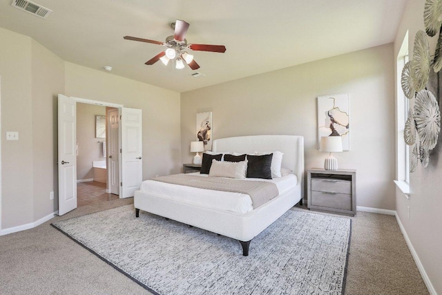 212 Boone Valley Dr, Round Rock, TX 78664 - carpeted bedroom with baseboards and ceiling fan