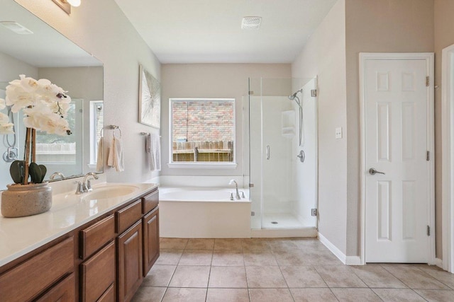 212 Boone Valley Dr, Round Rock, TX 78664 - full bathroom featuring healthy amount of natural light, a stall shower, a garden tub, and vanity
