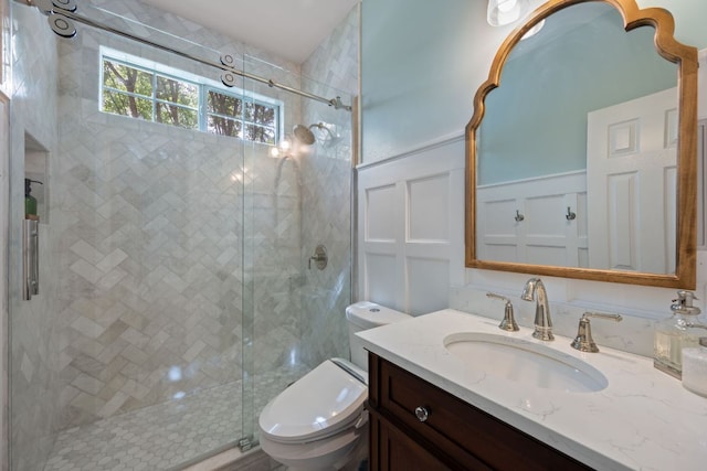 16210 Braesgate Dr, Austin, TX 78717 - bathroom with a stall shower, vanity, and a decorative wall
