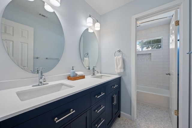 16210 Braesgate Dr, Austin, TX 78717 - bathroom featuring double vanity, tile patterned floors, and bathtub / shower combination