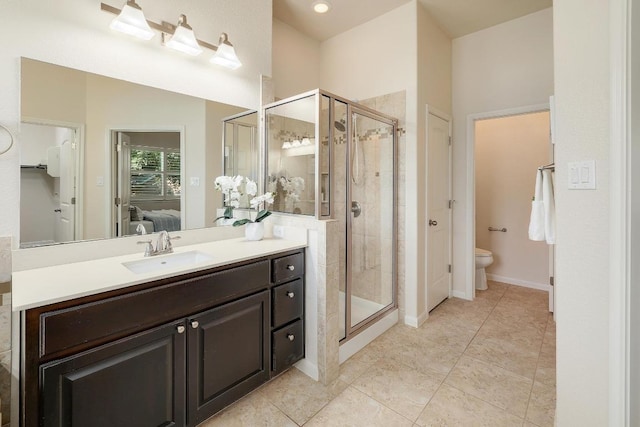 1200 Falling Hills Dr, Georgetown, TX 78628 - full bath featuring a shower stall, vanity, ensuite bathroom, tile patterned floors, and a closet