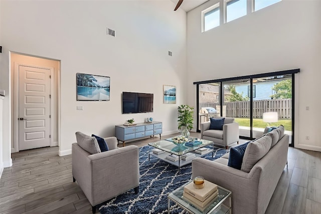 520 Germander Rd, Leander, TX 78641 - living room with a high ceiling and wood finished floors