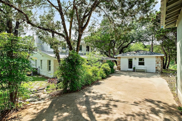 5204 Cueva Dr, Austin, TX 78738 - view of patio featuring concrete driveway