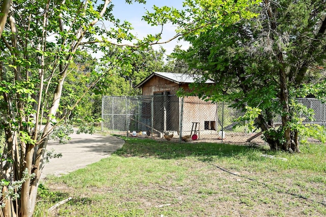 5204 Cueva Dr, Austin, TX 78738 - view of yard with an outbuilding