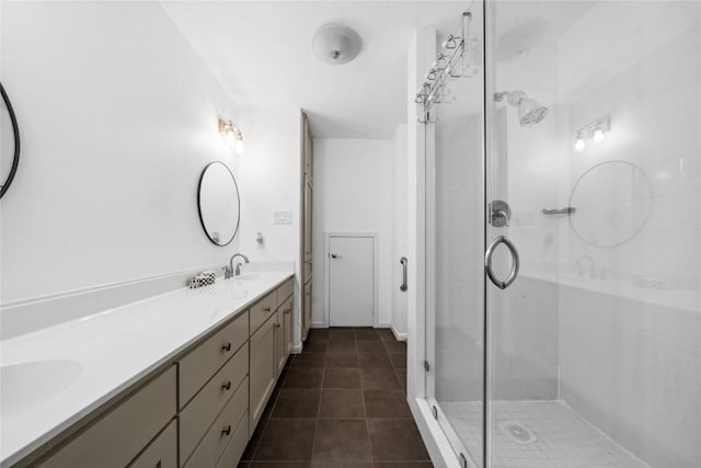 7162 Chimney Cors Unit 7204, Austin, TX 78731 - full bath with double vanity, a shower stall, and tile patterned flooring