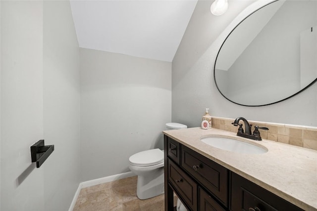 7162 Chimney Cors Unit 7204, Austin, TX 78731 - bathroom with vanity, lofted ceiling, and decorative backsplash