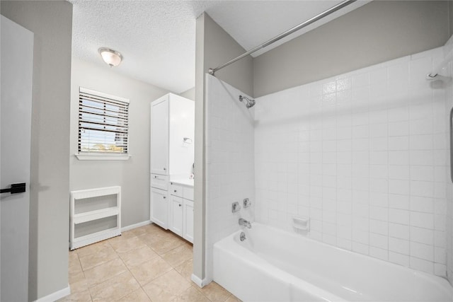 7162 Chimney Cors Unit 7204, Austin, TX 78731 - bathroom featuring shower / washtub combination, vanity, tile patterned flooring, and a textured ceiling