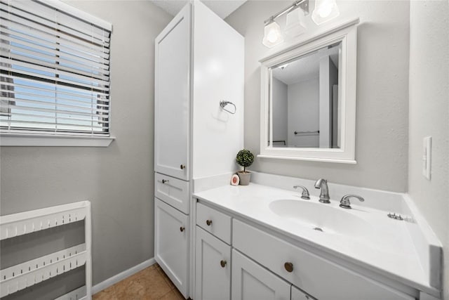 7162 Chimney Cors Unit 7204, Austin, TX 78731 - bathroom with vanity and tile patterned floors