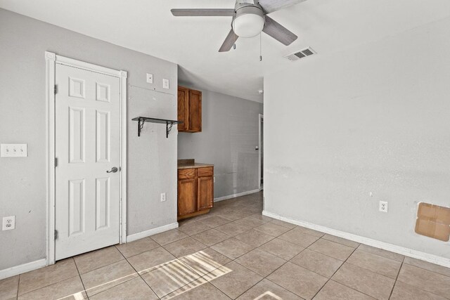 1703 Greyson Dr, Round Rock, TX 78664 - unfurnished room with light tile patterned floors and a ceiling fan