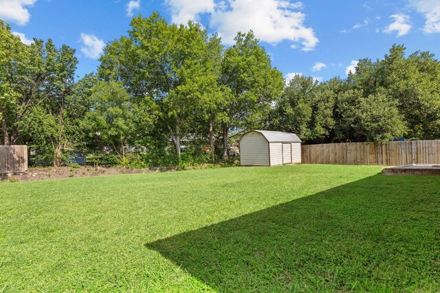 1703 Greyson Dr, Round Rock, TX 78664 - view of yard featuring a storage shed