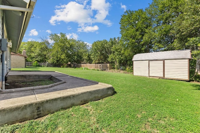 1703 Greyson Dr, Round Rock, TX 78664 - view of yard featuring a storage unit and view of scattered trees