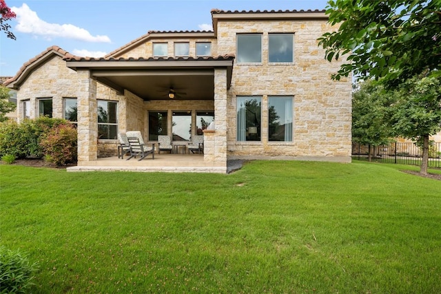 105 Curacao Ct, Austin, TX 78738 - rear view of property featuring a ceiling fan, a patio, and stone siding