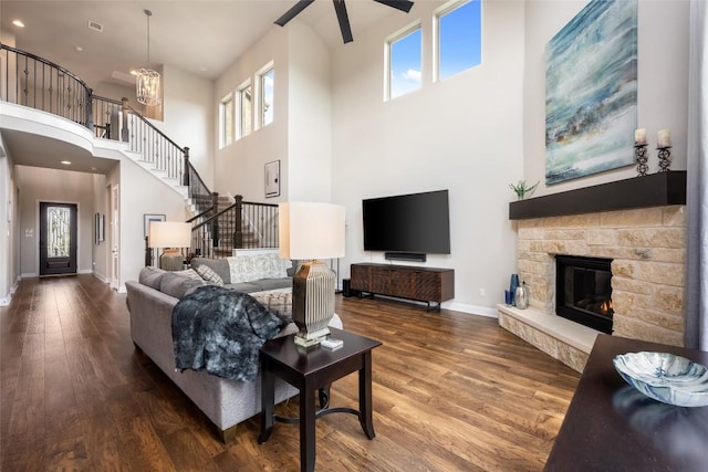 105 Curacao Ct, Austin, TX 78738 - living room featuring a ceiling fan, wood finished floors, a towering ceiling, plenty of natural light, and recessed lighting