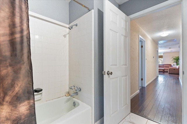 3704 Austin Cv, Lago Vista, TX 78645 - full bath featuring bathtub / shower combination and baseboards