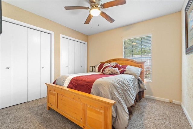 3704 Austin Cv, Lago Vista, TX 78645 - bedroom with carpet floors, multiple closets, and ceiling fan