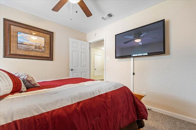 3704 Austin Cv, Lago Vista, TX 78645 - bedroom featuring carpet and ceiling fan