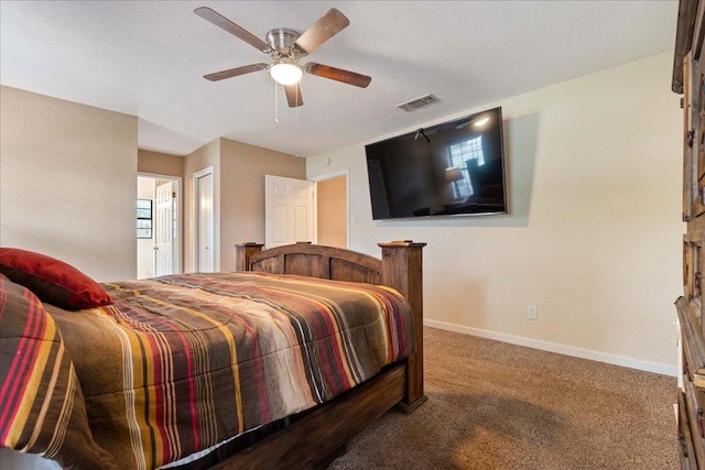 3704 Austin Cv, Lago Vista, TX 78645 - bedroom with carpet flooring and ceiling fan