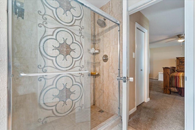 3704 Austin Cv, Lago Vista, TX 78645 - full bathroom with a ceiling fan, a tile shower, and connected bathroom