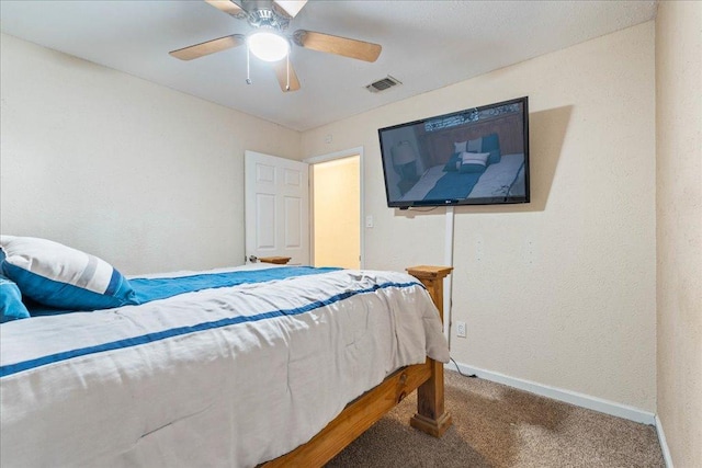 3704 Austin Cv, Lago Vista, TX 78645 - carpeted bedroom featuring baseboards and ceiling fan