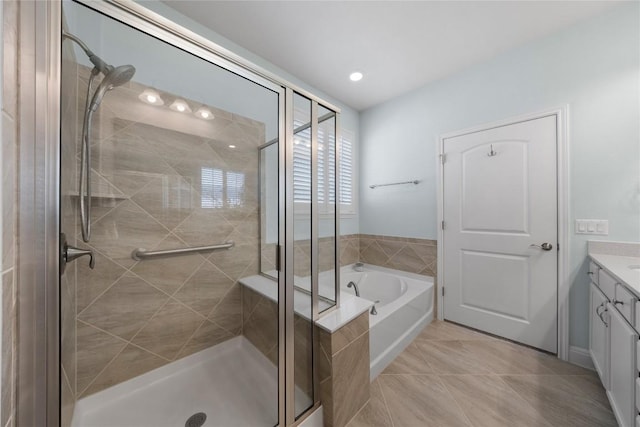 14 Acacia Way, Georgetown, TX 78633 - bathroom with vanity, a shower stall, and a bath