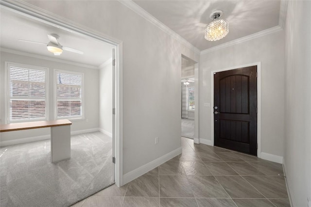 14 Acacia Way, Georgetown, TX 78633 - foyer with crown molding, a chandelier, and tile patterned floors