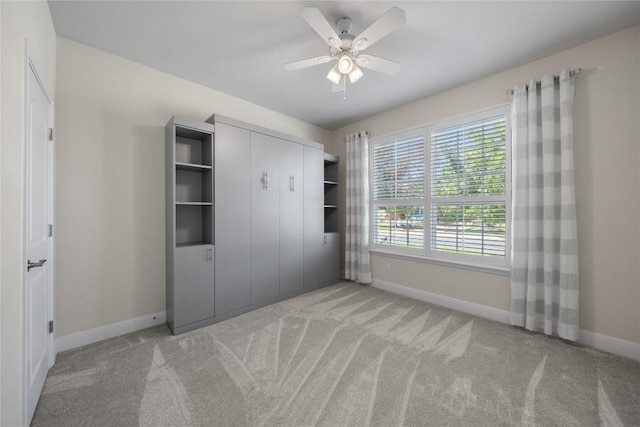 14 Acacia Way, Georgetown, TX 78633 - unfurnished bedroom with light carpet, ceiling fan, and a closet