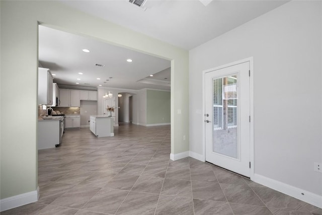 14 Acacia Way, Georgetown, TX 78633 - unfurnished living room featuring recessed lighting and baseboards