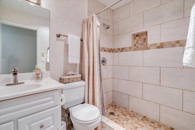 1321 Warrington Dr, Austin, TX 78753 - bathroom featuring vanity and a tile shower
