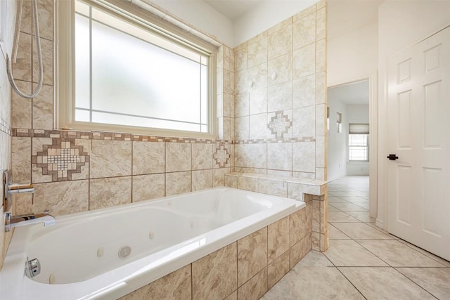 211 E Creek Dr, Dripping Springs, TX 78620 - bathroom featuring a jetted tub and tile patterned flooring