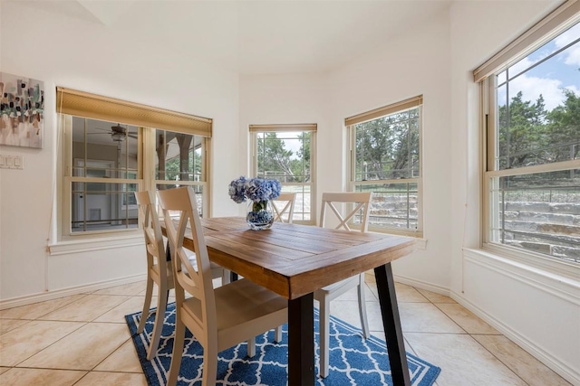 211 E Creek Dr, Dripping Springs, TX 78620 - dining area with light tile patterned flooring and ceiling fan