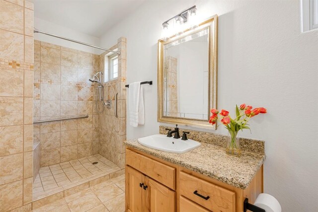 211 E Creek Dr, Dripping Springs, TX 78620 - full bath with a tile shower and vanity