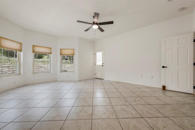 211 E Creek Dr, Dripping Springs, TX 78620 - unfurnished room with a ceiling fan, light tile patterned flooring, and a smoke detector