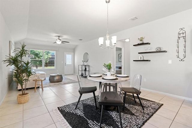2010 Grow Ln, Austin, TX 78754 - dining area featuring a ceiling fan, light tile patterned floors, and a chandelier
