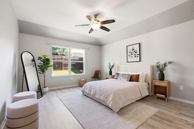 2010 Grow Ln, Austin, TX 78754 - bedroom with light wood-style floors and a ceiling fan