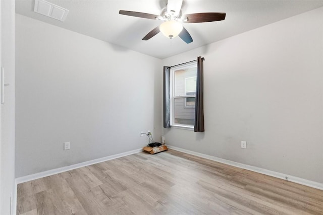2010 Grow Ln, Austin, TX 78754 - empty room featuring wood finished floors and ceiling fan